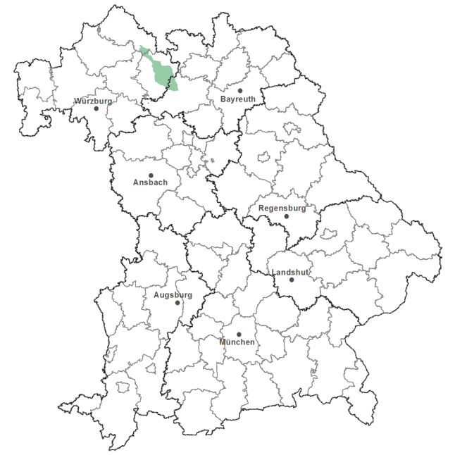 Die Karte zeigt das Bundesland Bayern. Zusätzlich sind die Grenzen der bayerischen Regierungsbezirke zu erkennen. Die ausgewählte Region ist als grüner Flächenumriss gekennzeichnet. Die Region Hassberge liegt im Norden von Bayern.